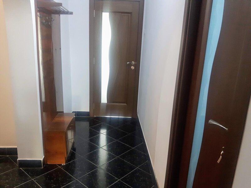 Bd Nicolae Titulescu  2 camere decomandat-bloc amvelopat
